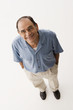 Senior Hispanic man with hands in pockets