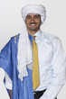Middle Eastern man wearing traditional dress and business attire