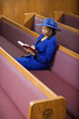 Senior African American woman in church