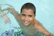 Hispanic boy in swimming pool