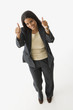 Hispanic businesswoman giving thumbs up