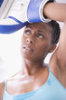 African American woman wearing boxing gloves