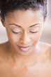 African American woman looking down