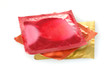 Colorful condoms isolated on white