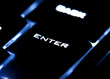Photo: Closeup shot of glowing enter button Closeup shot of glowing enter button