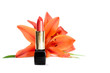 New lipstick and lily flowers, isolated on the white background New lipstick and lily flowers, isolated on the white background