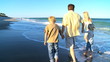 Video: Happy Young Family Together at the Beach Happy Young Family Together at the Beach
