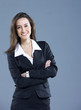 Attractive businesswoman with her arms crossed.