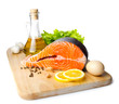 Fresh salmon steak on wooden cooking desk wiht