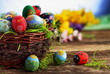 Easter eggs and natural wooden country table Easter eggs and natural wooden country table