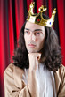 King with crown against background King with crown against background
