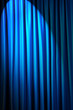 Brightly lit curtains in theatre concept