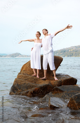 Photo: romantic couple at beach romantic couple at beach