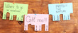 Color advertisements on wooden background