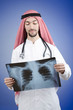 Arab doctor with x-ray print
