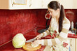 Woman cutting cabbage
