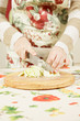 Woman hands slicing cabbage