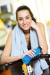 Portrait of a relaxed attractive young woman after exercise