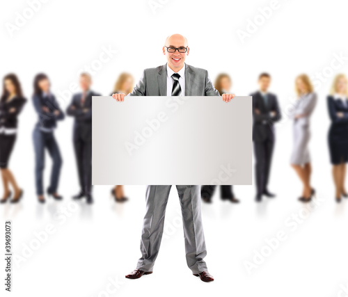 Photo: Succesfull business man and group holding a banner Succesfull business man and group holding a banner