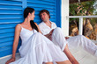 Romantic young couple in tropical beach house