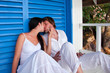 Romantic young couple in tropical beach house