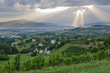 Sun rays shining down a small town