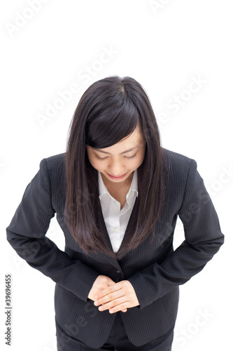 Photo: 頭を下げる女性 頭を下げる女性