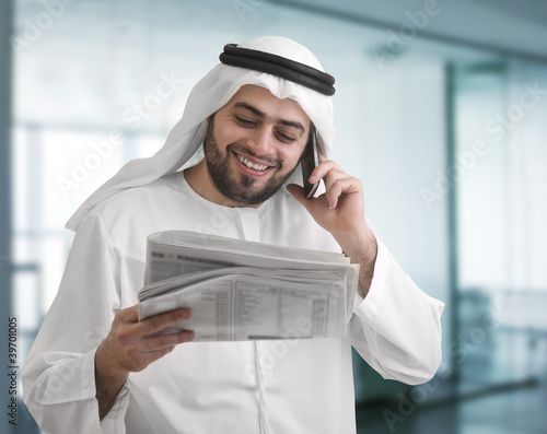 Photo: arabian business man in office arabian business man in office