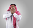 Deep fear of an arabian businessman against a smokey background