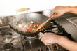 an image of vegetables in a wok