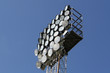 towers with spotlights and floodlights to illuminate the stadium