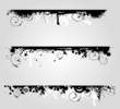 Three grunge banners with floral elements