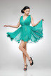 brunette in teal dress brunette in teal dress