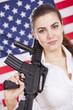 Photo: patriotic woman with gun over american flag patriotic woman with gun over american flag