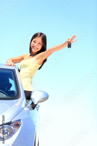 Photo: Car woman showing car keys Car woman showing car keys