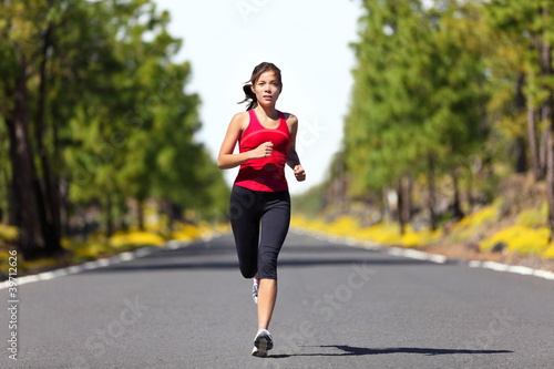 Photo: Sport fitness running woman Sport fitness running woman