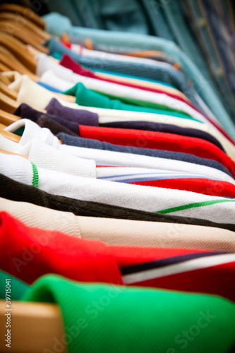 Photo: Shirt rack at market Shirt rack at market