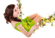 Girl swinging on flower swing. Isolated.