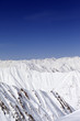 Snowy mountains and blue sky. Caucasus Mountains, Georgia. Snowy mountains and blue sky. Caucasus Mountains, Georgia.