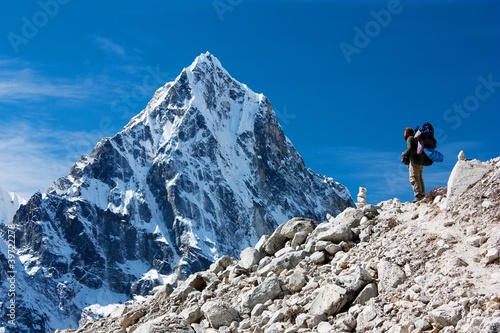 Photo: hiker on mountains - way to everest base camp hiker on mountains - way to everest base camp