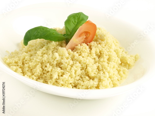 Photo: Couscous meal on isolated background Couscous meal on isolated background