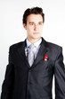 portrait of a young manager for motor with a small red toy car