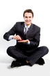 portrait of a young manager for motor with a small red toy car