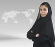 Photo: professional islamic girl with hijab against business background professional islamic girl with hijab against business background