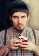 Englishman with a cup