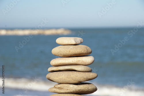 Photo: relaxing pile of stones on the beach relaxing pile of stones on the beach