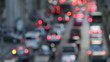 Out of focus light of traffic on a street Out of focus light of traffic on a street