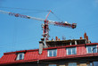 Construction site with crane over a building Construction site with crane over a building