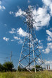 Electric power station in the field in blue cloudy sky Electric power station in the field in blue cloudy sky
