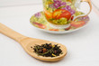 Foto: The wooden spoon with green tea. The wooden spoon with green tea.